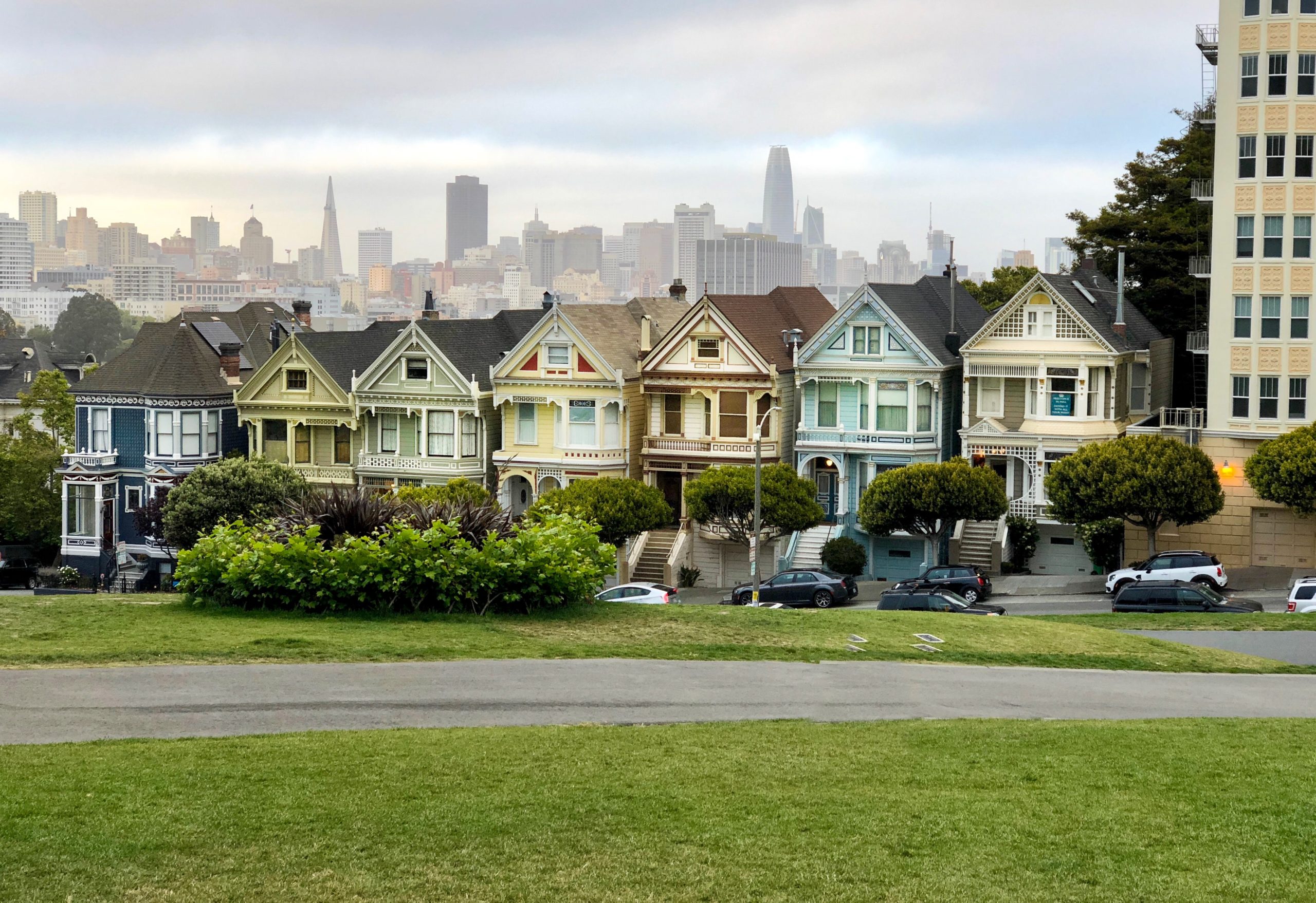 line of homes in san francisco with grassy common ground area